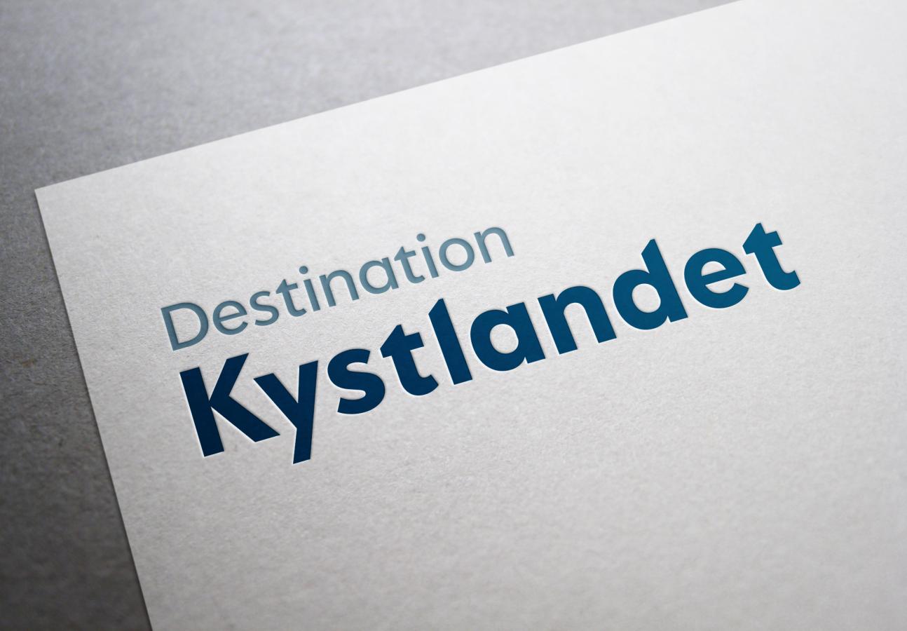 Brevhoved med Destination Kystlandet logo