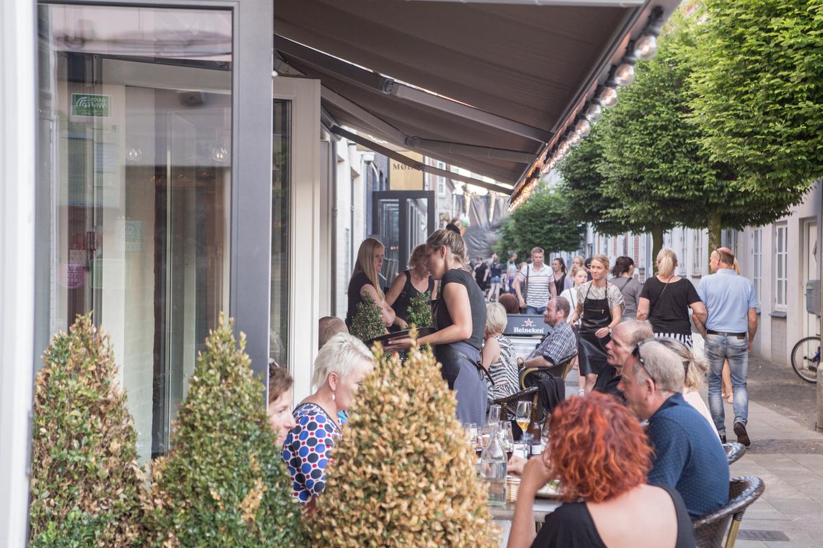 People sitting outside of Cafe Gran